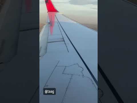 A video shows screws coming loose a Boeing 737-700's wing