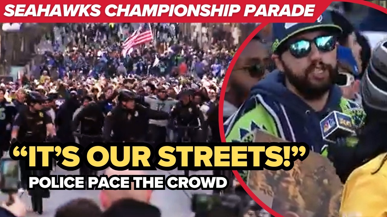 Seahawks parade route: police let crowds move up after buses pass to keep distance