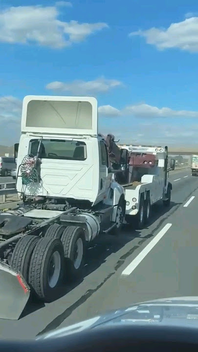 Tow Truck Passes Me