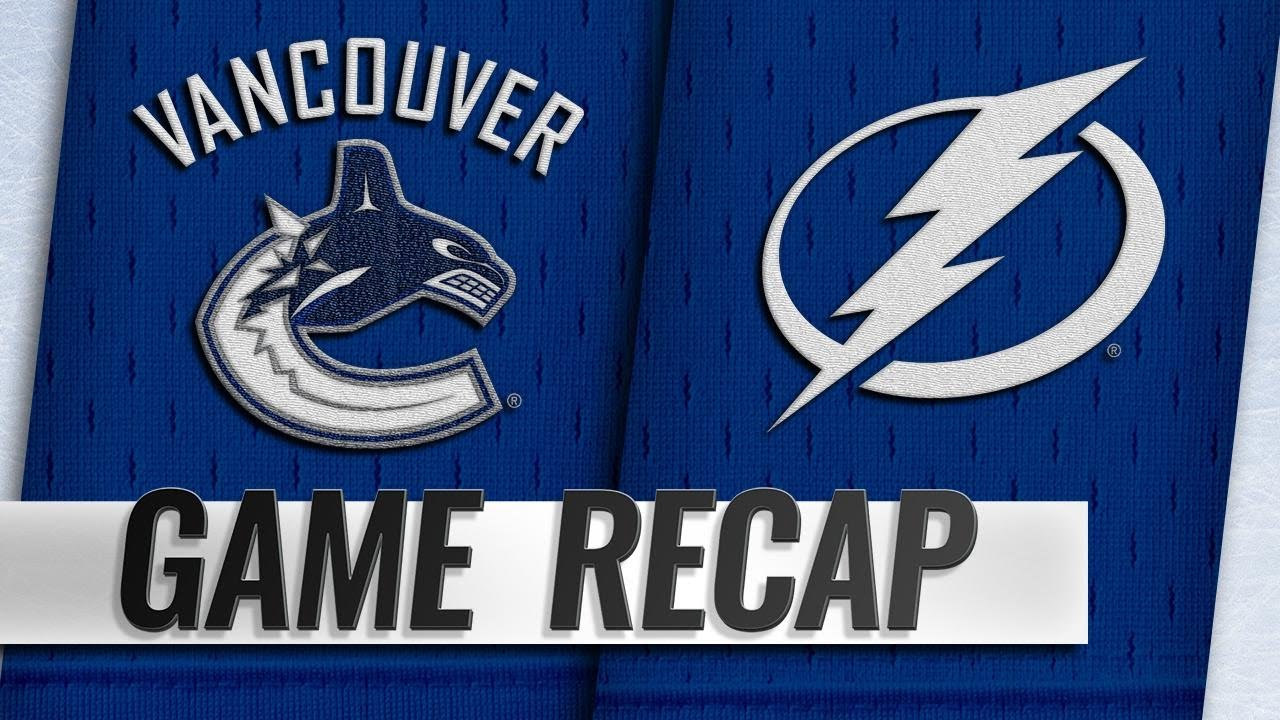 Canucks score four in the 3rd to down Lightning - YouTube