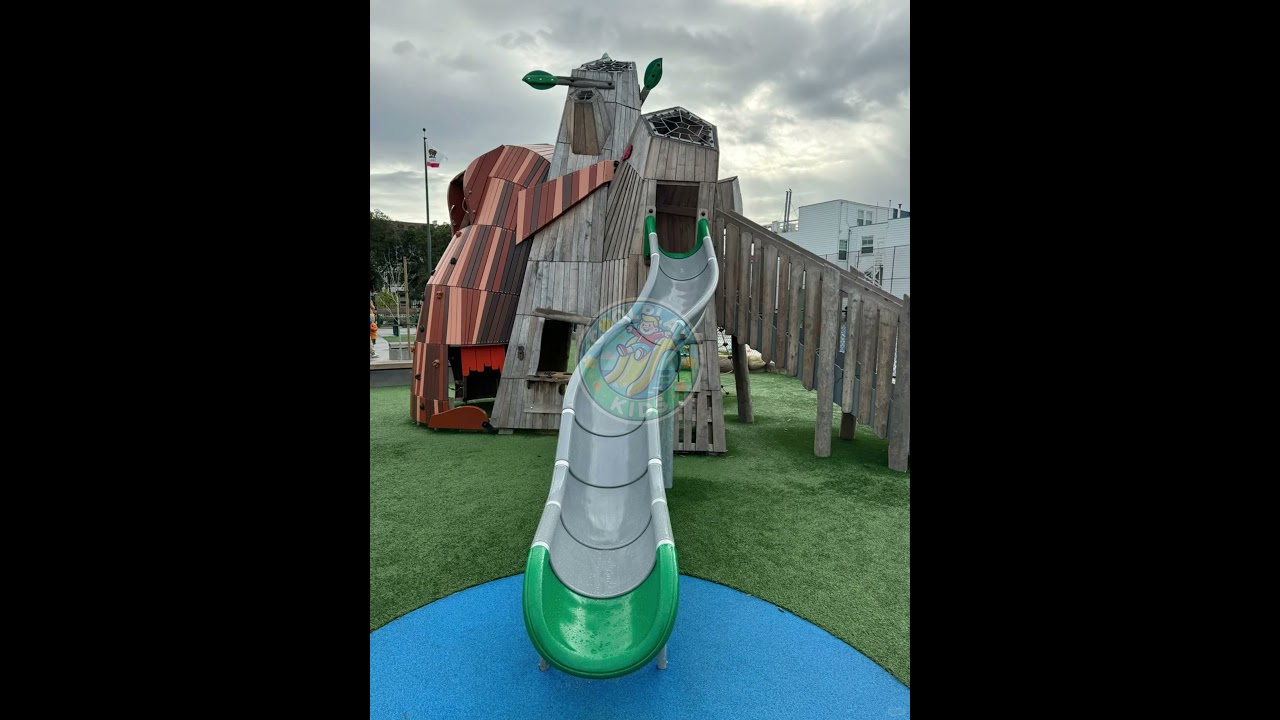 Child Playing on Bear-Themed Playground: Fun Outdoor Adventure