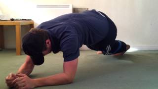Plank with Alternating Toe Touches Outside of the Body