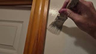 How to paint straight lines around door trim