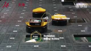 Just like the Minions: robots sort parcels in a huge warehouse of a Chinese delivery firm