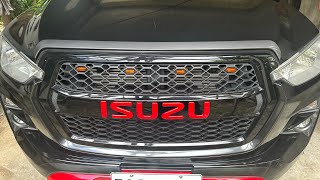 How do I install a grille light on my Isuzu D-Max