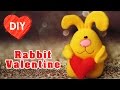 Funny yellow rabbit with heart. Gift for Valentine&#39;s Day.