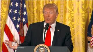 Scorning media, Trump denies reports of chaos during wide-ranging news conference
