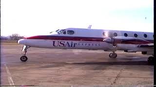 US AIR Express Beechcraft 1900C-1 turboprop leaves the Manhattan, KS airport in Nov. 1993