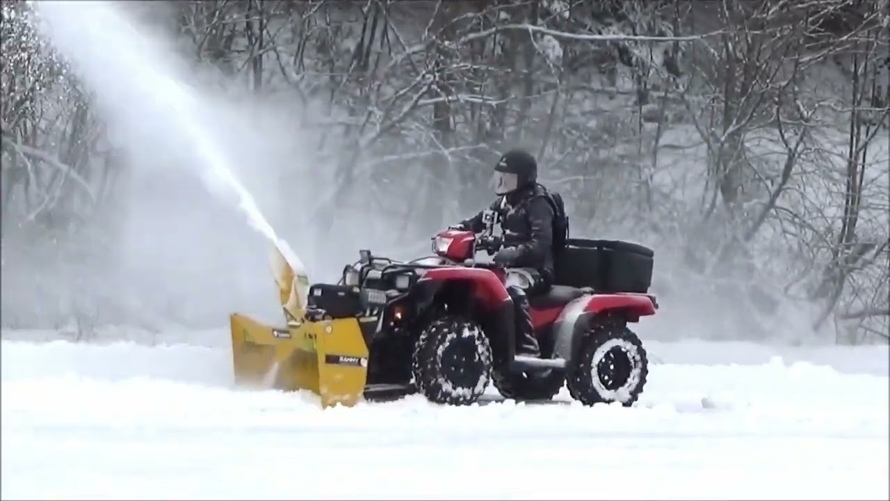 ATV using a snowblower
