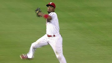 COL@PHI: Rollins makes a great jump and throw for out