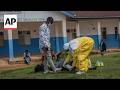 Health workers battle Ebola outbreak as normal life continues in Congo