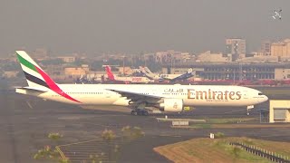 Emirates Boeing 777 landing and taxing at Mumbai Airport