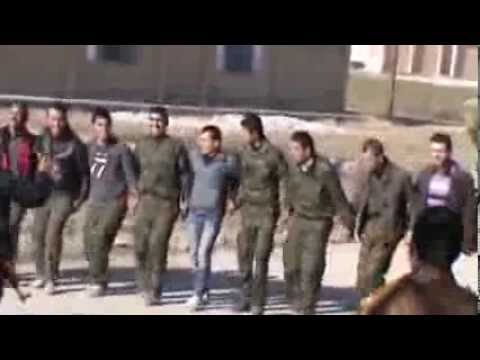 YPG and YPJ fighters dance after victory in Tal Maruf