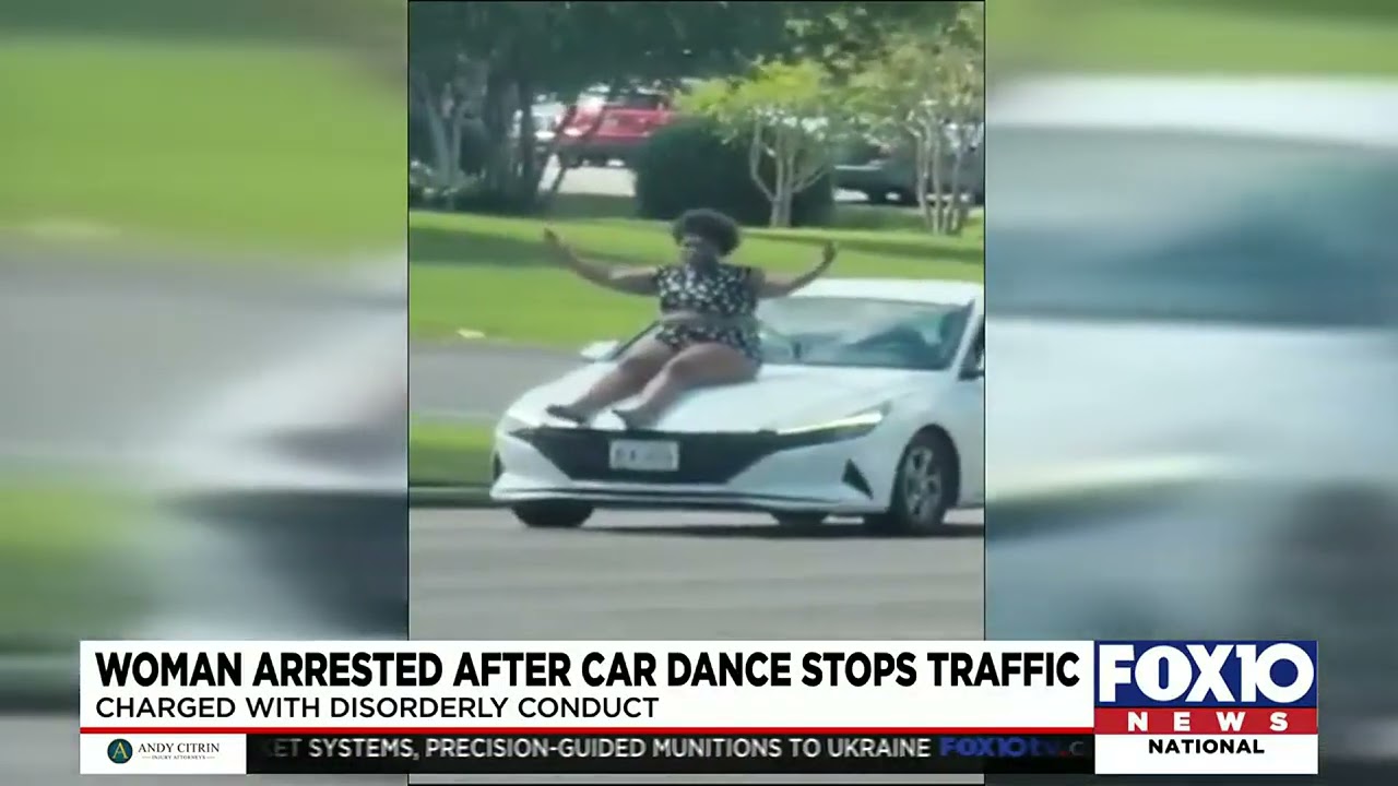 Woman arrested after car dance stops traffic - YouTube