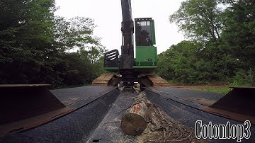 Loading the John Deere 2154D track loader