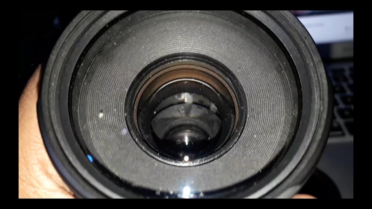 Canon 75300 mm lens Dust, fungus clean on front lens inside