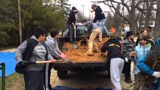 Slauson Middle School students help build educational garden