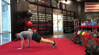 Slider straight leg forward and reverse bear crawls