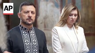 Zelenskyy and his wife pray at a church on Ukraine's 34th Independence Day