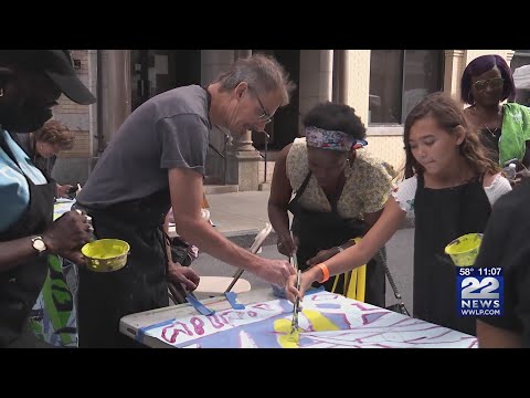 Climate Justice themed mural paint party held at Springfield Jazz and Roots Festival