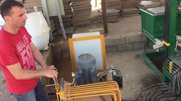 Conmach BlockKing-09MS Block Making Machine during Double T type Interlocking Paver Production