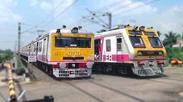 Colorful different model EMU local trains crossing at a Rail gate🚦 busy level crossing