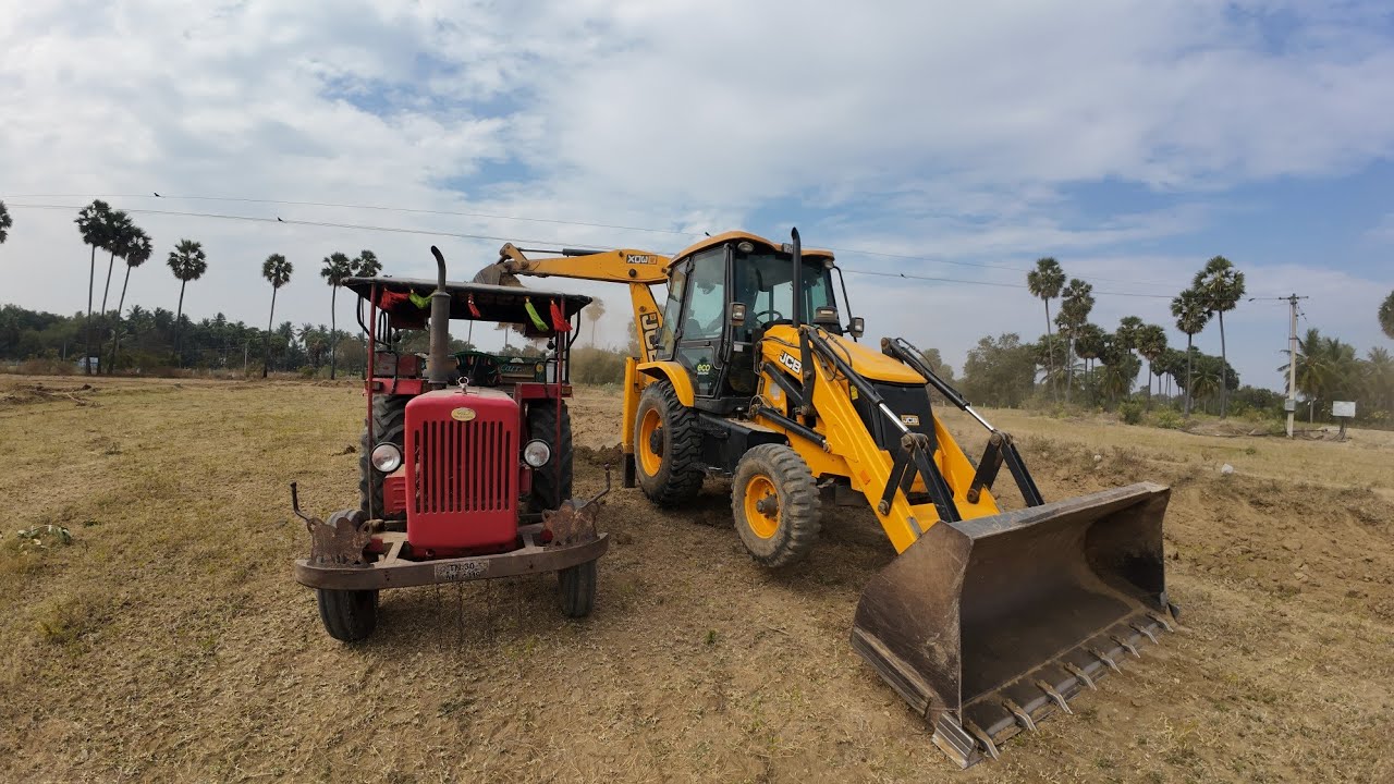 Part 3 jcb 3dx backhoe loading with mahindra 415 and 575 land leavaling video..