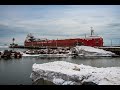 Like a Drum Beat, The ice banging off the Hull of the CSL Assiniboine as they arrive Duluth for ore.