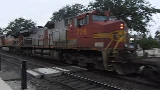 BNSF 4349 leads baretable train with BNSF 776 a BNSF warbonnet in Plano IL