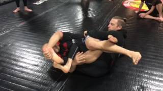 Top Half Guard Toe Hold to Knee Bar Attack