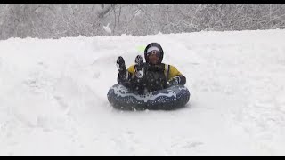 Download Lagu People sledding after snow falls in Iowa MP3