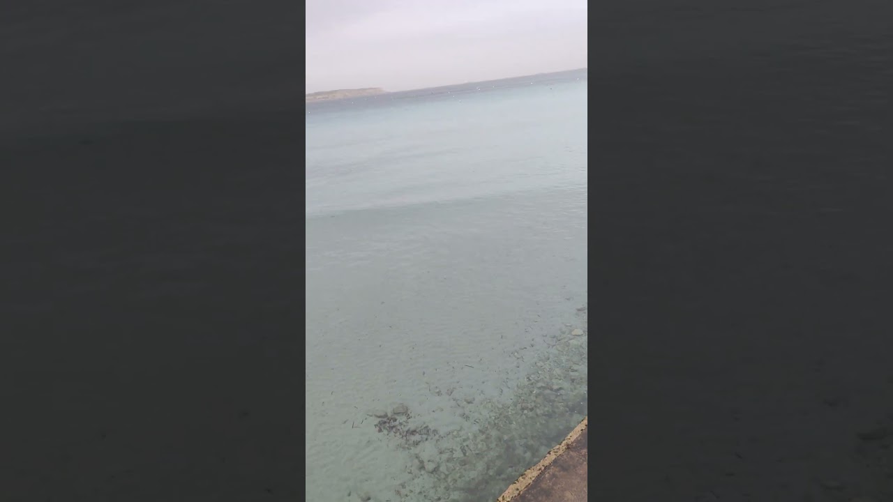 foggy evening with clear sea water 