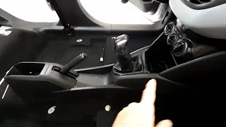 como remover console central do Peugeot 208