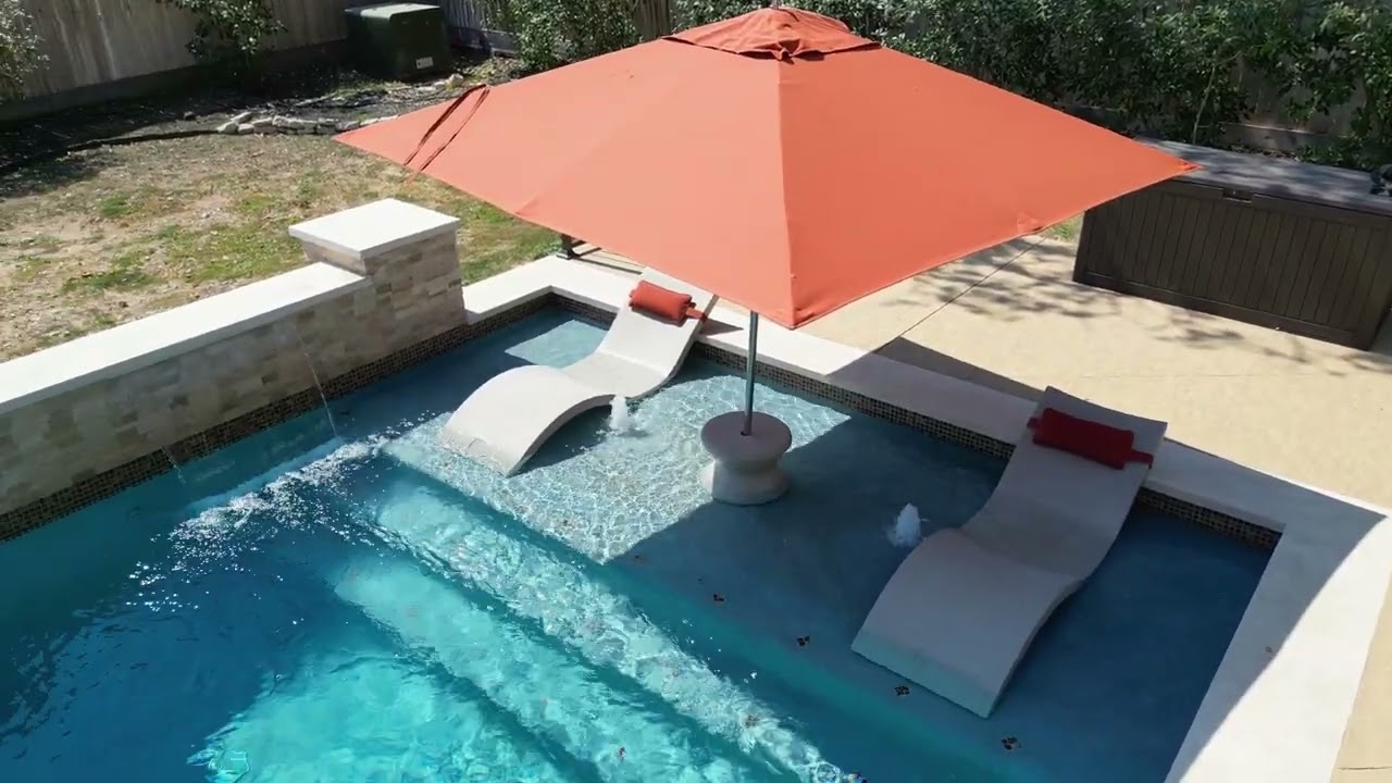 35'x15' Rectangular pool with 30' water feature wall.