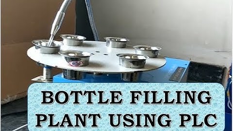 AUTOMATIC BOTTLE FILLING  PLANT / MACHINE USING PLC | (ALLEN BRADLEY-1400 SERIES)
