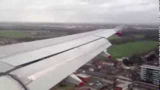BA A320 landing at London Heathrow on a windy day