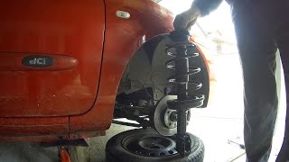 How to replace front shock absorber and coil spring - Renault