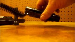 Servicing the barrel assembly of a powder actuated tool