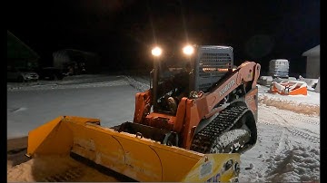 Snow plowing with Kubota skid steer