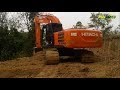 Hitachi Zaxis 200 Excavators Digging Land for Construction of Plantation Roads