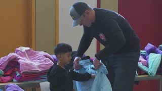 Portland firefighters hand out 1000 coats to kids