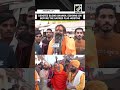 Devotee blows ‘Shankh’ in joy before historic flag hoisting at Shri Ram Janmabhoomi Mandir