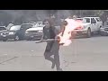 Suspect Throws Torch into Seattle Police Car With an Officer inside