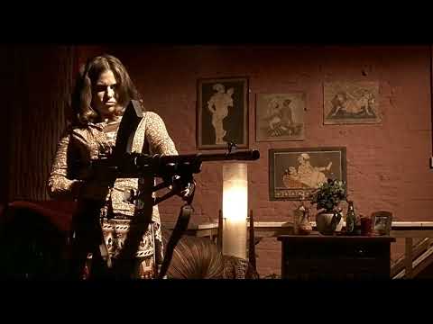 Girl with machine gun. Scene from Lock, Stock and Two Smoking Barrels