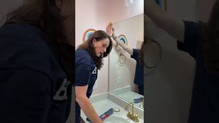 Adding a Flower Frame to a Bathroom Mirror | #diy