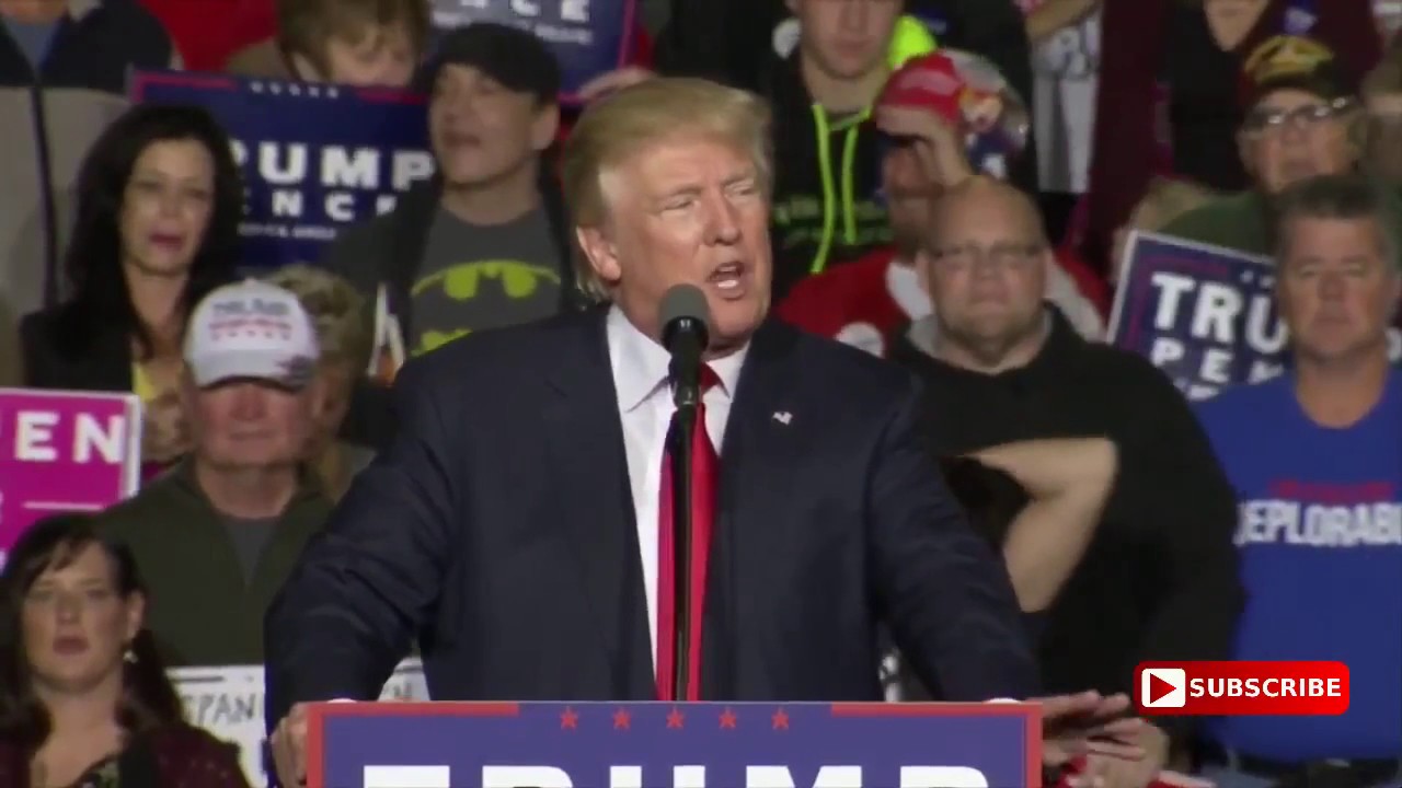 Guy Dabs Behind Donald Trump During Ohio Rally Speech