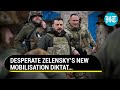 Zelenskys new draconian move ukrainians filming mobilisation drive can now be jailed  watch