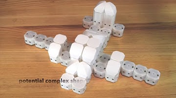 Robotic Assembly of Haptic Proxy Objects for Tangible Interaction and Virtual Reality