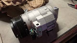 BT4Z-19703-A. Ford Edge AC compressor  from parts geek