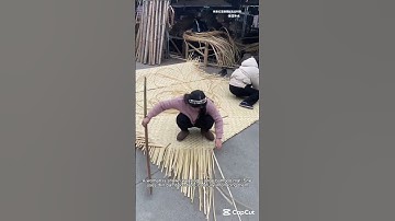 Woman Weaving a Bamboo Mat with Expert Skill